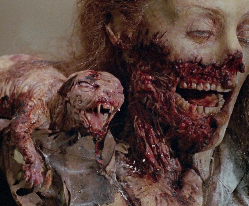two evil eyes image of the dead wife and the zombie cat