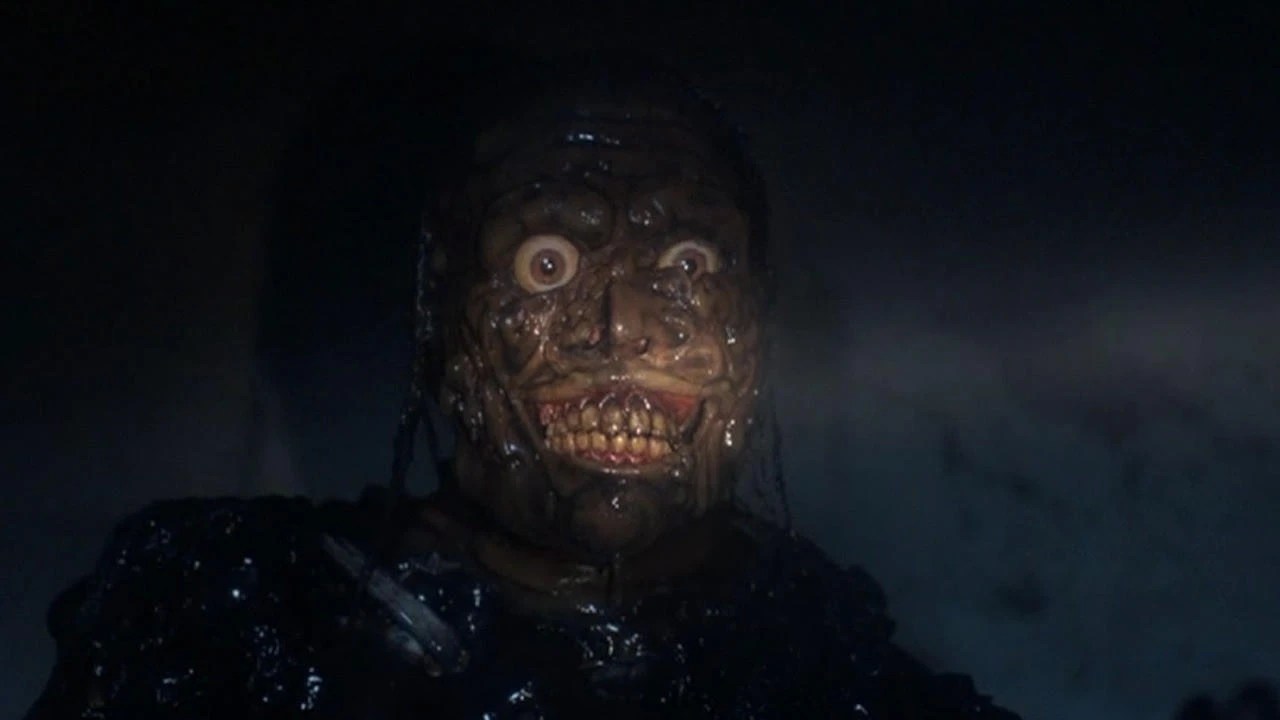 a close up of a zombie face