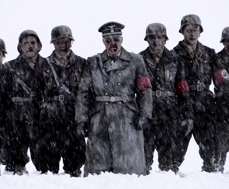 dead snow - a bunch of nzi zombies stand in the snow